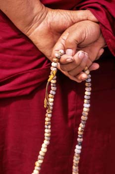 <b>India, Leh</b>, Monk Hands with rosary